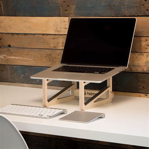 We have now got stock of our portable, wooden laptop stands | Helmm