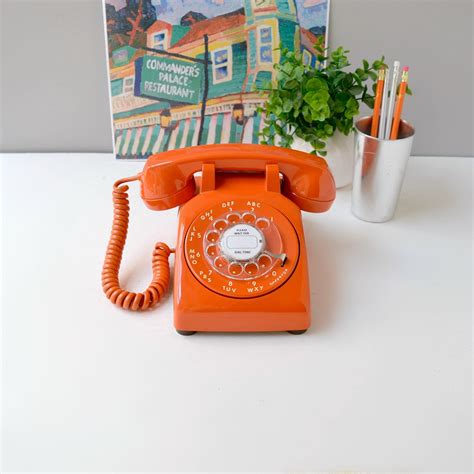 Vintage rotary phone; working rotary dial telephone in orange; orange retro phone; 1970's rotary ...
