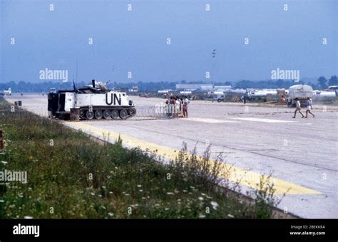 1995 Tuzla, Bosnia - UN tank protecting the UN Tuzla airfield temporary refugee camp for Bosnian ...