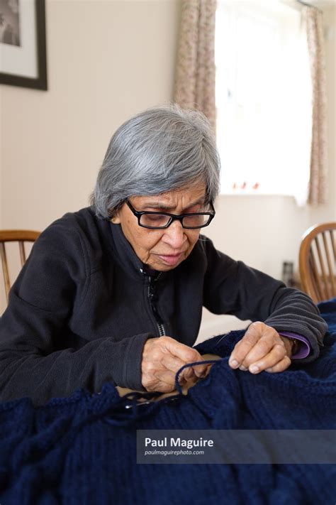 Buy a photo - Old woman knitting - Paul Maguire