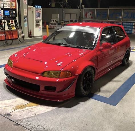 Red Honda Civic Coupe Parked at Gas Station