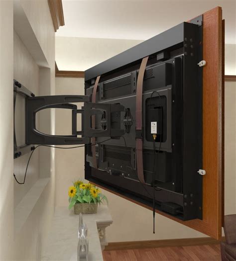 recessed tv using a swing arm mount with the frame attached to the tv ... | Framed tv, Frames on ...