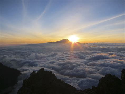 Kilimanjaro at sunrise from Mount Meru-Arusha, Tanzania | Naturalia.me | Mount meru, Mount ...