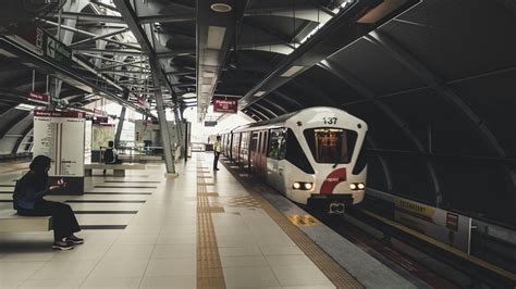 Indoor Train Station With Few People Waiting for the Train · Free Stock Photo