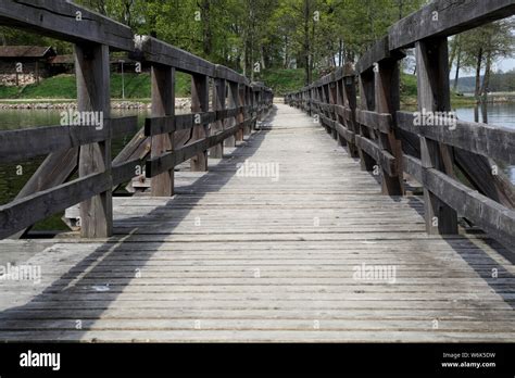 wooden bridge over the river Stock Photo - Alamy