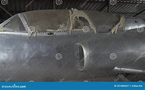 Cockpit of Wrecked Military Jet Aircraft Parked in a Partially Covered Warehouse Stock Video ...