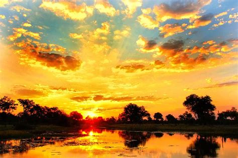 Okavango Delta Sunset Photograph by Amanda Stadther - Fine Art America