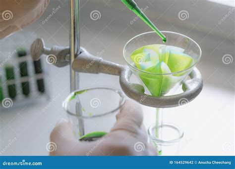 Filter Paper In Laboratory. Scientists Are Chemical Filtration By ...