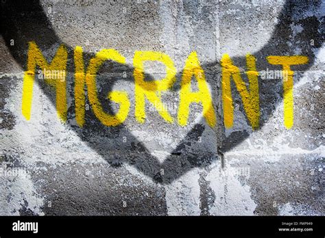 Graffiti on migration, a heart for refugees, Welcome symbol Stock Photo ...