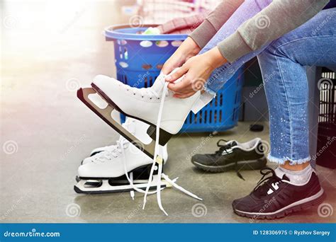 Woman Laces Figure Skates in Sports Shop Stock Image - Image of leisure, entertainment: 128306975