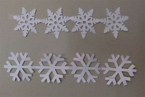 Paper Chain Snowflakes | Paper chains, Snowflake cutouts, Paper snowflakes diy