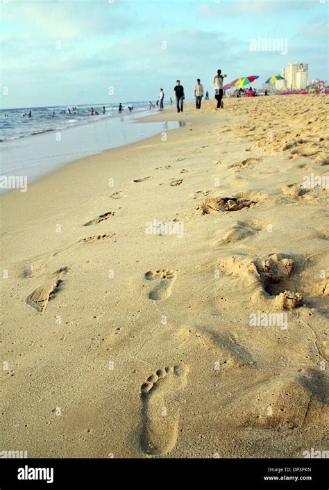 Jul 03, 2006; Gaza City, GAZA STRIP; The boys steps on the beach of ...