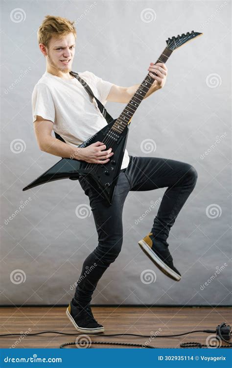 Man Playing on Electric Guitar Stock Photo - Image of hobby, guitar ...