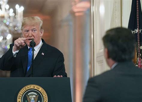 Trump goes off on CNN's Jim Acosta, who refuses to sit down at press ...