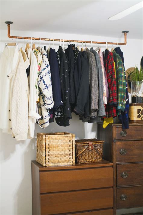 Hanging Copper Pipe Clothing Rack DIY - A Beautiful Mess