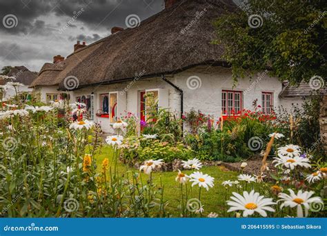 Cottage In Adare, Ireland. Stock Image | CartoonDealer.com #49356055