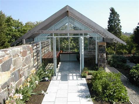 Roof Garden House with a Beautiful Rooftop Greenhouse