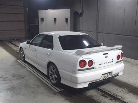 Nissan Skyline R34 25GT-X turbo 4 Door Auto (Japan Stock) – Outsiders Auto