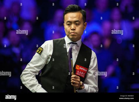 Marco Fu of Hong Kong considers a shot to Ronnie O'Sullivan of England ...