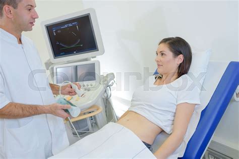 doing an ultrasound procedure | Stock image | Colourbox