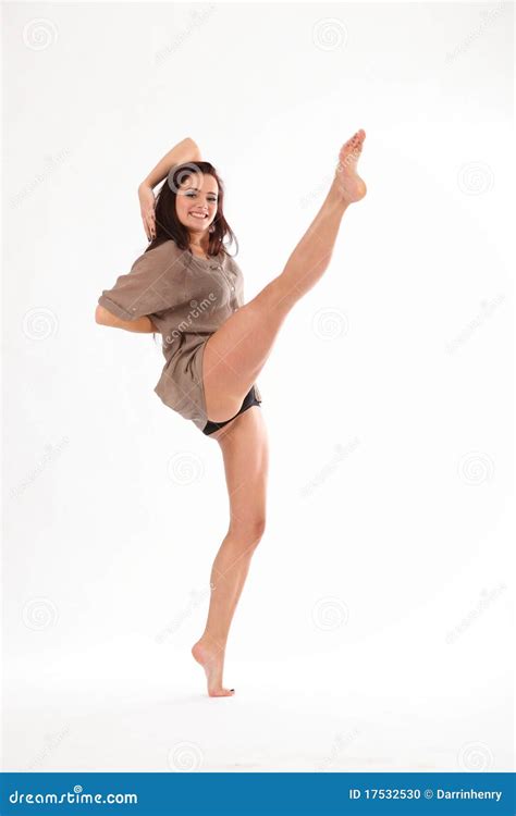 High Kick Dance By Happy Young Woman In Studio Stock Photo - Image ...