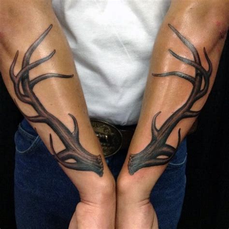 Typical realistic looking forearm tattoo of deer horns - Tattooimages.biz