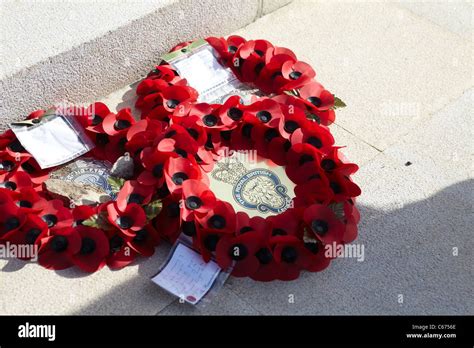 Poppy wreaths left by the Royal British Legion at a memorial over ...