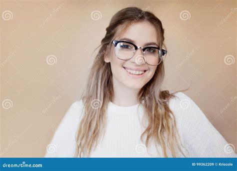 Happy and Beautiful Girl with Glasses and Braces. Young Woman Smiling ...