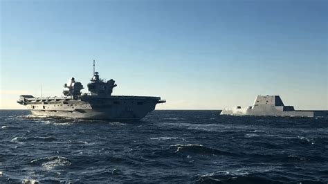 Zumwalt class destroyer USS Micheal Monsoor meets with HMS Queen Elizabeth (847x476) : WarshipPorn