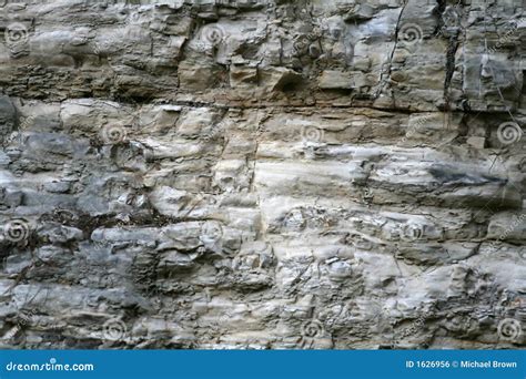 White rock wall stock photo. Image of minerals, rock, geologic - 1626956