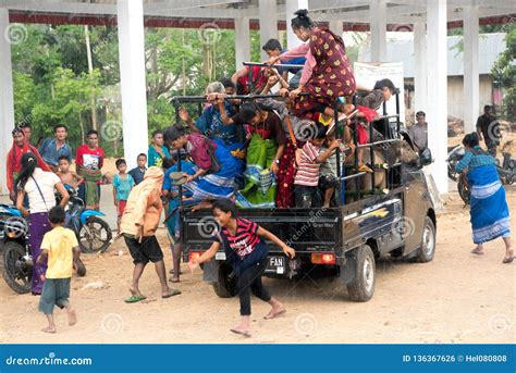 Passenger Transport on Open Car in Heavy Rain, Kodi, Sumba Island ...