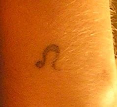 Homemade symbol little tattoo - Tattooimages.biz