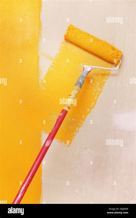 painting wall with orange color Stock Photo - Alamy