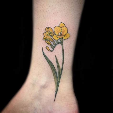 22 Beautiful and Delicate Freesia Tattoo Designs - Page 2 of 2 - TattooAdore