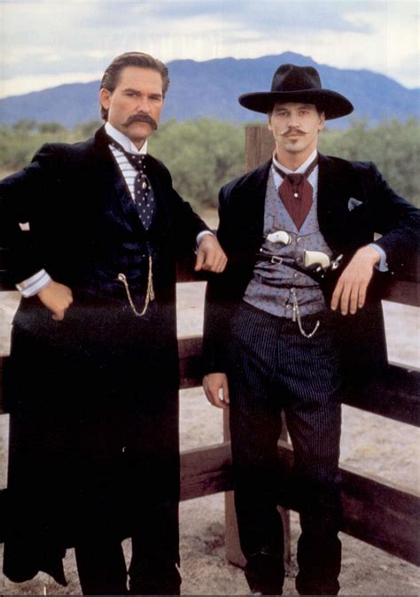 Kurt Russell and Val Kilmer as Wyatt Earp and Doc Holliday, respectively, in Tombstone. 1993 : r ...