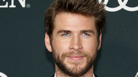 Here's What Liam Hemsworth's Tattoos Really Mean