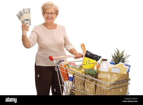 Old woman shopping cart hi-res stock photography and images - Alamy