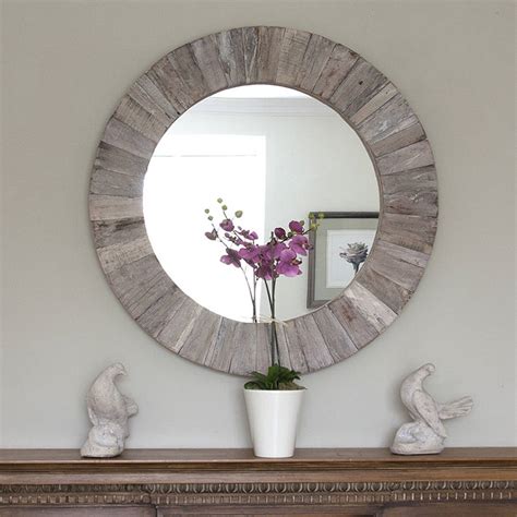 round wooden mirror by decorative mirrors online | notonthehighstreet.com