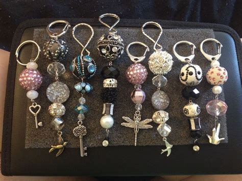 Make your own keychains! So easy! Just buy strands of beads and key rings. Use jewelry pliers ...