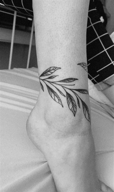 Ankle leaves tattoo