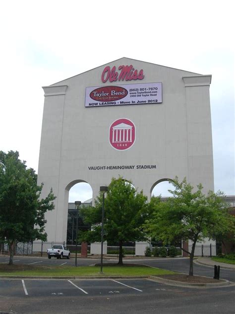 the building is white and has two arches