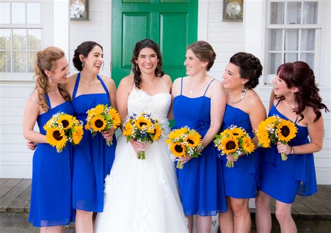 Bridesmaids in Royal Blue Cocktail Dresses with Sunflower Bouquets | Royal blue bridesmaids ...