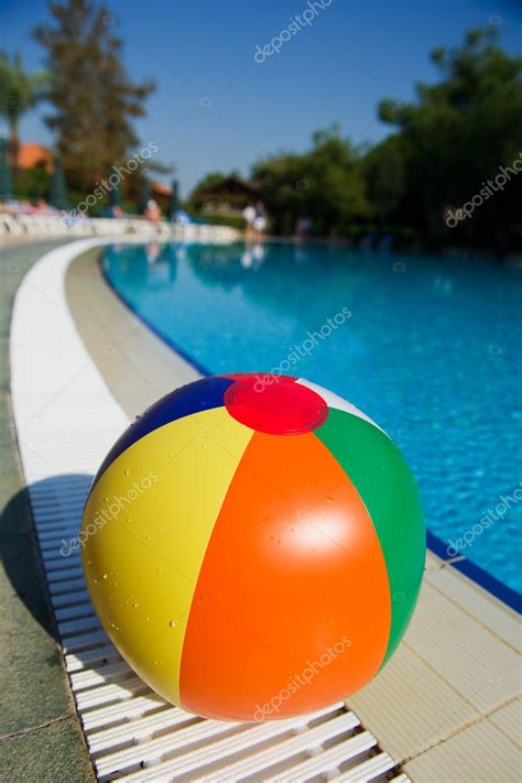 Beach ball at swimming pool Stock Photo by ©ivonnewierink 10071754