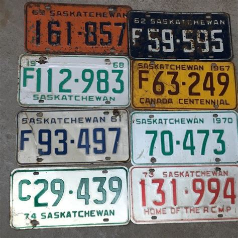 LOT OF 8 SASKATCHEWAN LICENSE PLATES *VINTAGE*