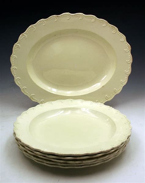 English 18th Century plain Creamware pottery plates and oval dish - John Howard