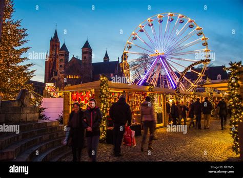 Christmas market on Vrijthof square, old town, with many stands and a ferris wheel. Maastricht ...