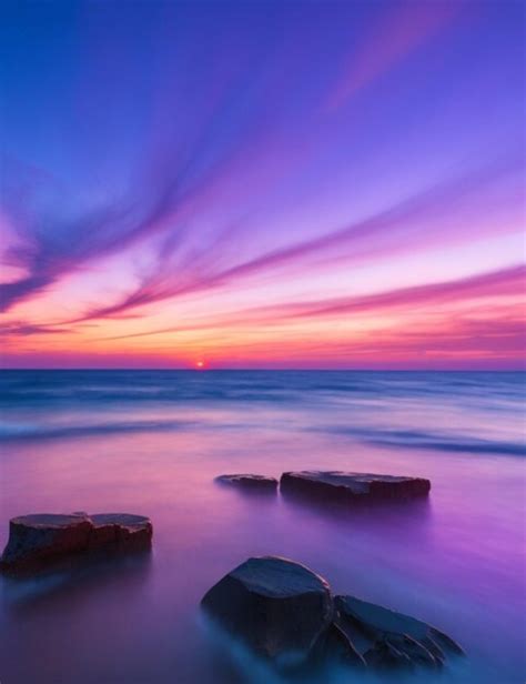 Premium AI Image | Document the beauty of a sunset with a long exposure shot