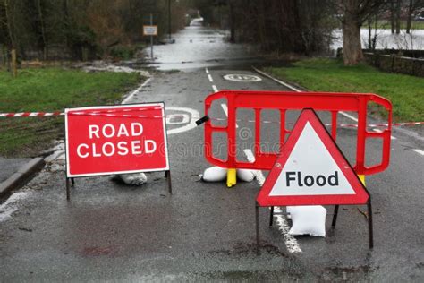 Road closed and flood sign stock image. Image of natural - 37880413