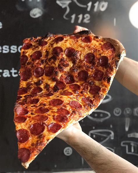 ≡ New Foodie Trend Is A Giant Pizza Slice – The Biggest You've Seen 》 Her Beauty