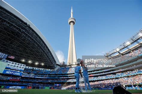 Vladimir Guerrero Jr. #27 of the Toronto Blue Jays dumps a cooler on ...